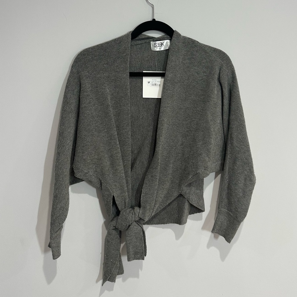 Seek the label wrap sweater. Size Extra Small